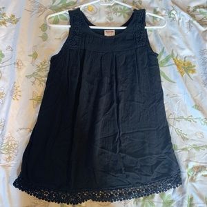 Bock tank top with embroidery on the bottom